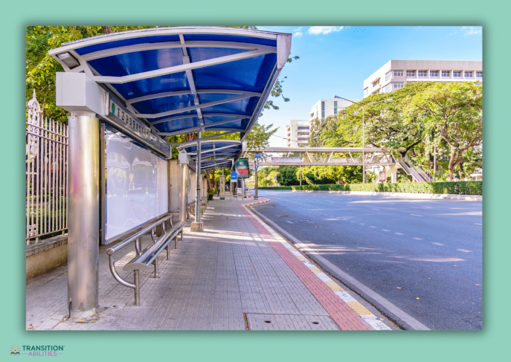 Empty bus stop beside city street