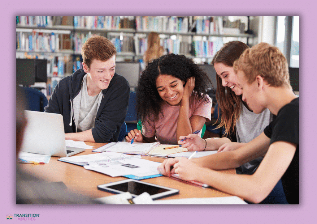 Group of students studying together in library