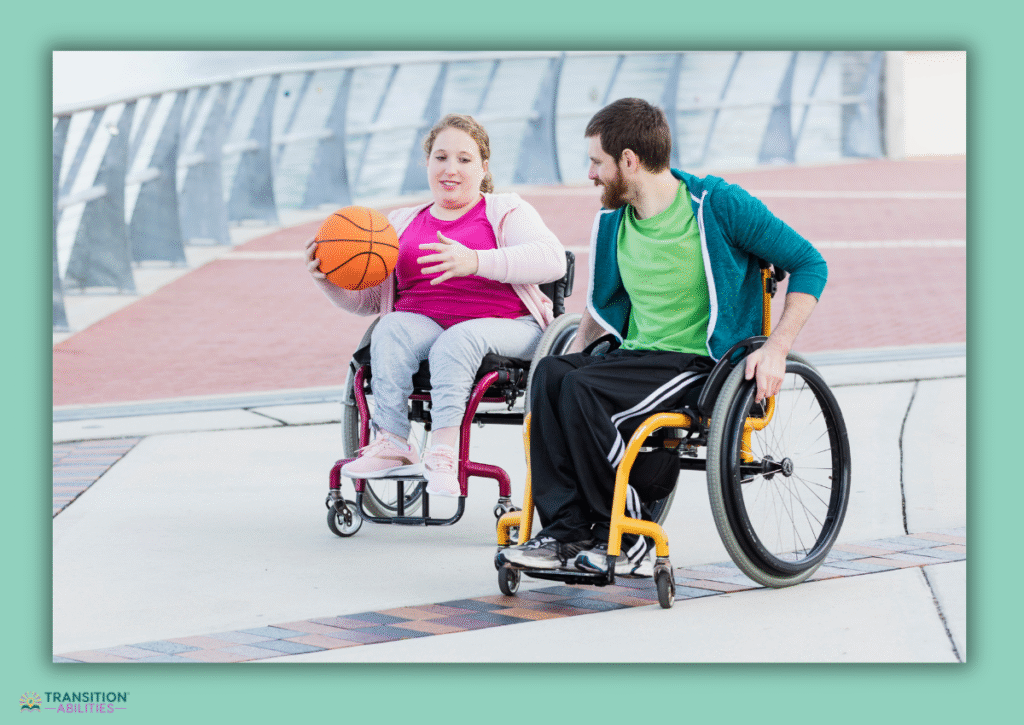 Two people in wheelchairs playing basketball outside