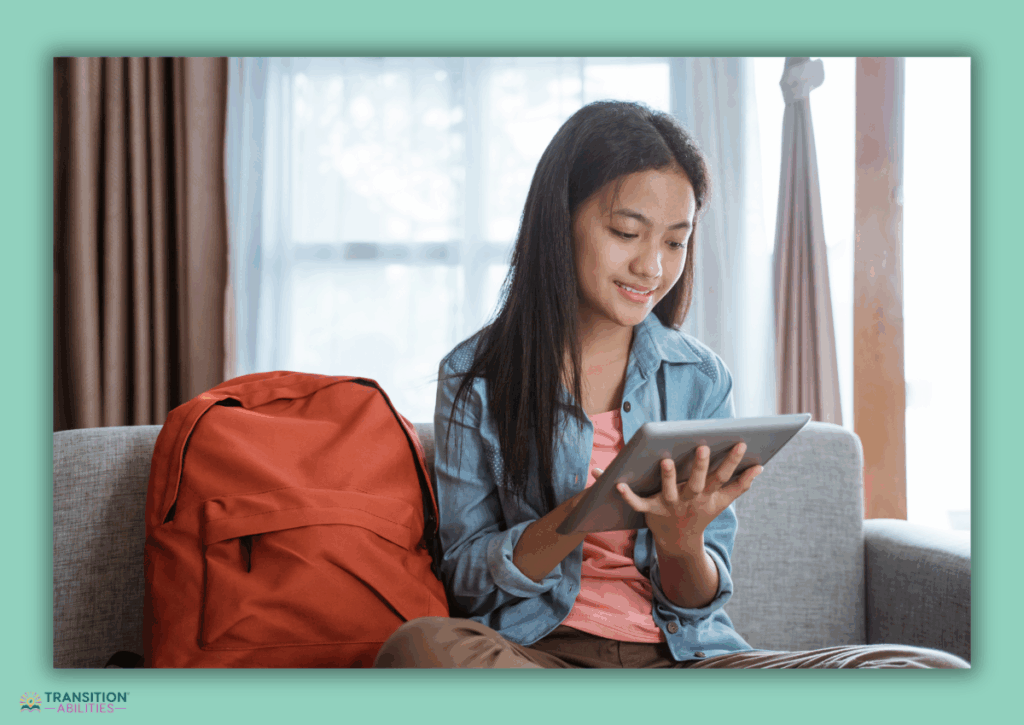 Student sitting with backpack using a tablet