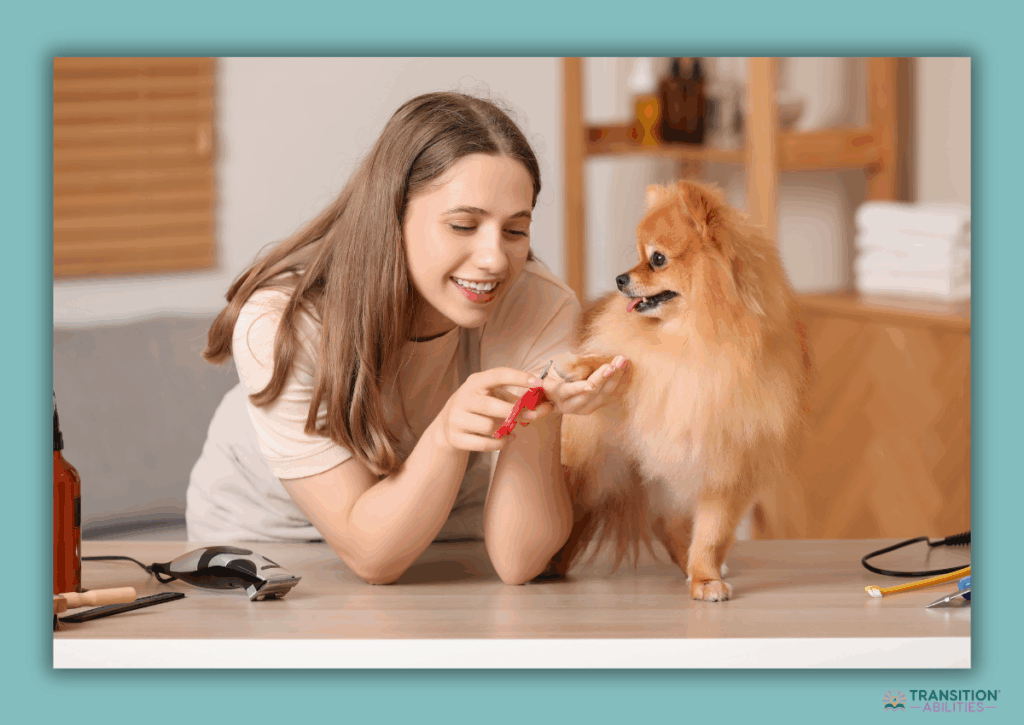 Woman trimming a small dog’s nails on a table