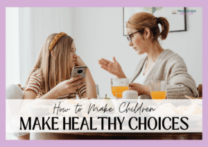 Adult talking with a child at a table