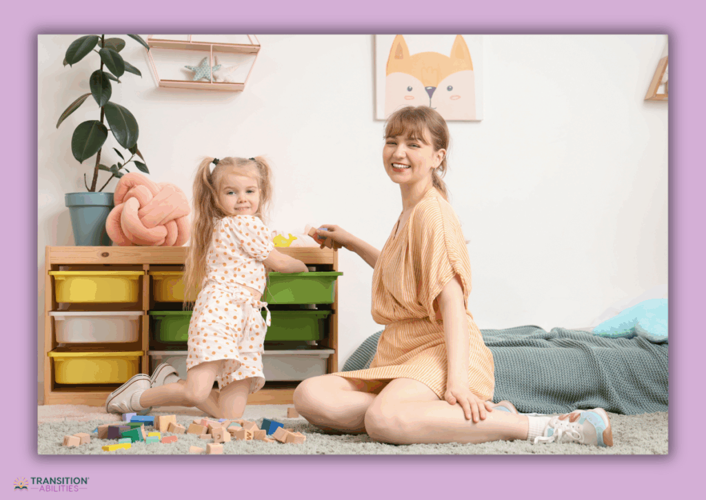 Adult and young child playing and cleaning up toys in a playroom.