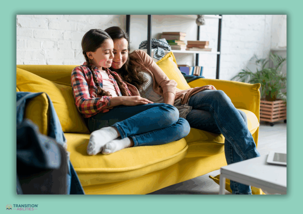 Parent and child sitting together on a couch, sharing a calm moment.