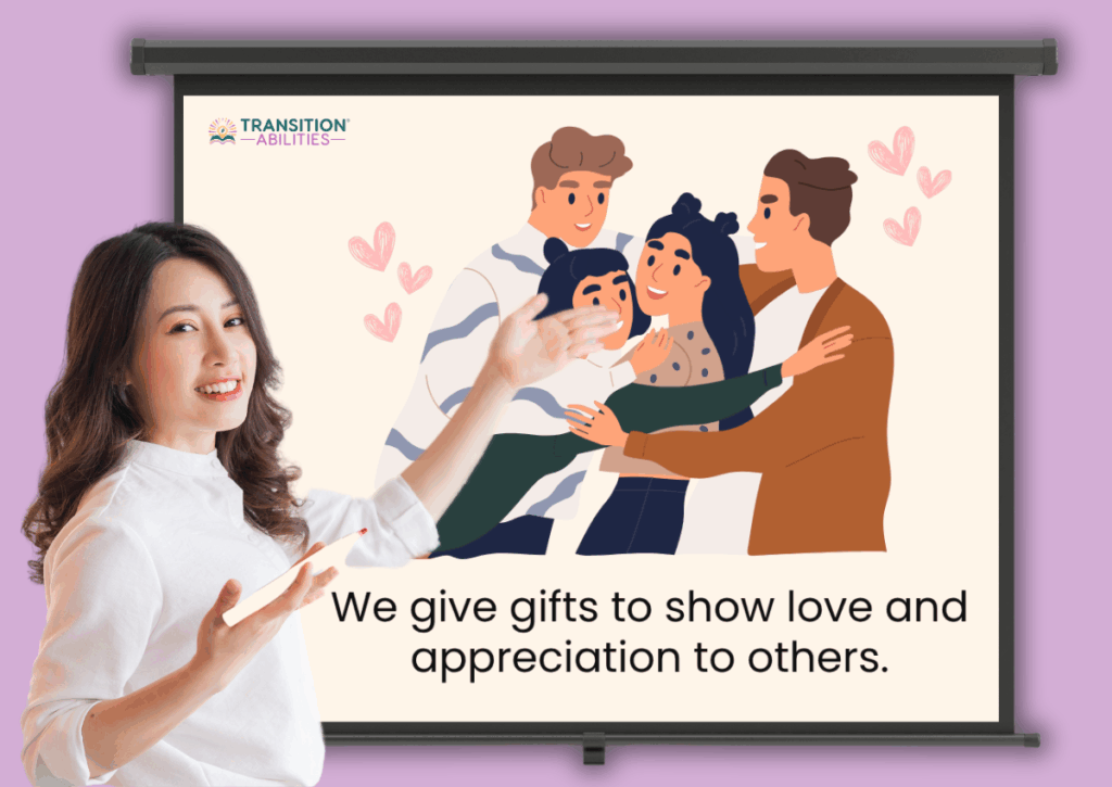 Teacher presenting a slide with an illustration of people hugging and text “We give gifts to show love and appreciation to others.”
